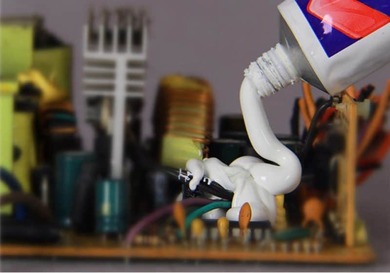 p3 applying silicone adhesive on pcb