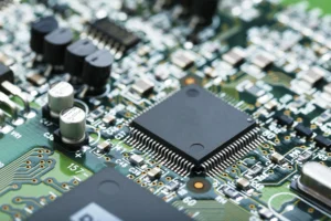 High-resolution view of a populated PCB with SMT components and precise solder joints